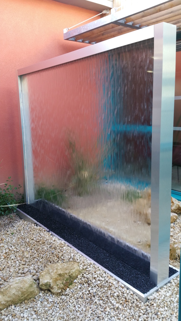 Glass and stainless steel water wall, Saint-Varent Health Center