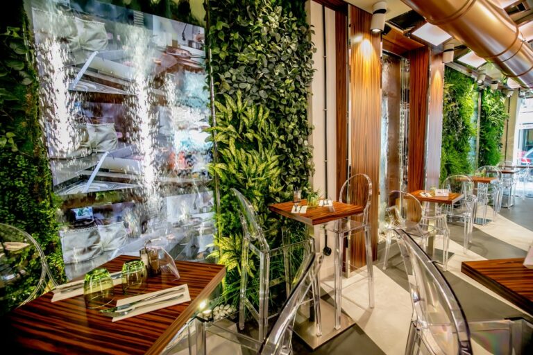 Artificial green walls and a water wall for a bakery