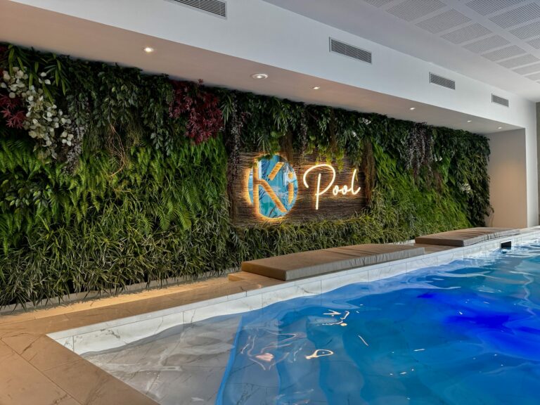 Kispace Odzo offers green walls with custom logos.